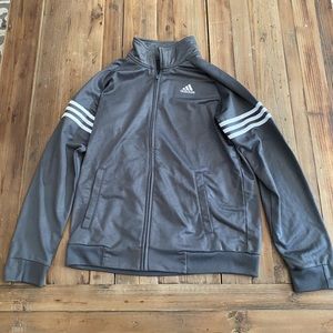 One gray adidas lightweight jacket.